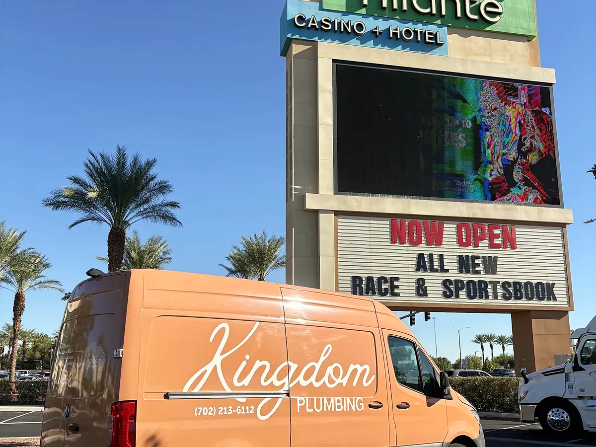 Kingdom Plumbing service van beside the Aliante sign, serving North Las Vegas