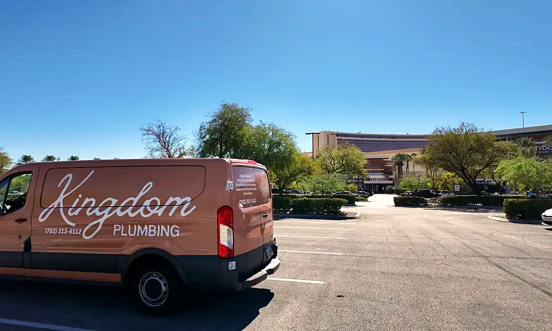 Kingdom Plumbing van with the company logo in a palm-lined Las Vegas lot